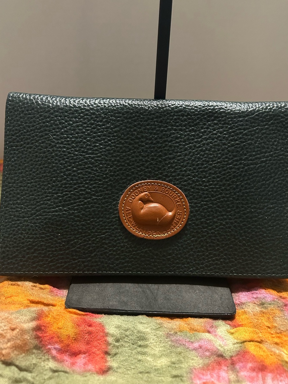 Dooney & Bourke Black Pebbled Leather Clutch With Brown Logo and Wallet.